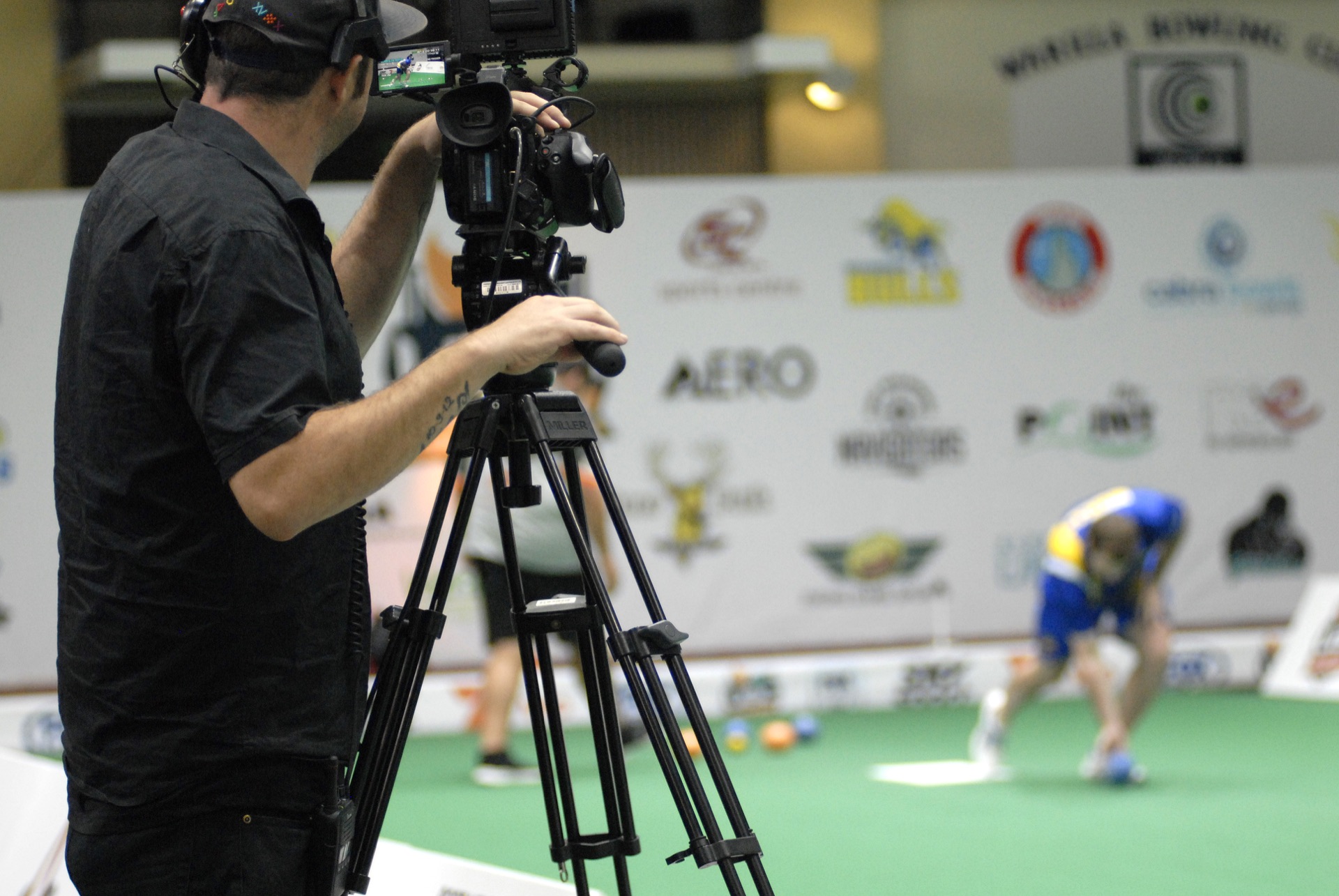 Camera operator filming an Ultimate Bowls™ Championship match