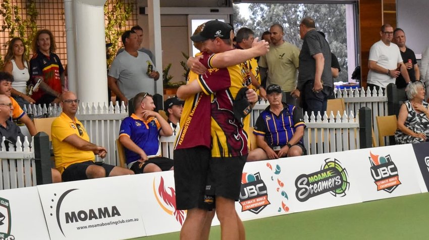 Flemington Kensington players embracing beside the rink in front of the crowd during Ultimate Week 2024